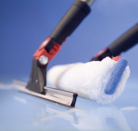 03-window-cleaning-01-evolution-window-cleaning-01-evolution-washer-evolution-washer-squeegee-inuse-580x550.jpg-ClonedDuringMediaCleanUp0123456-carouselImage.jpeg